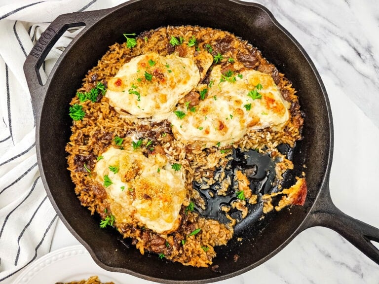 French onion chicken and rice bake in a skillet.