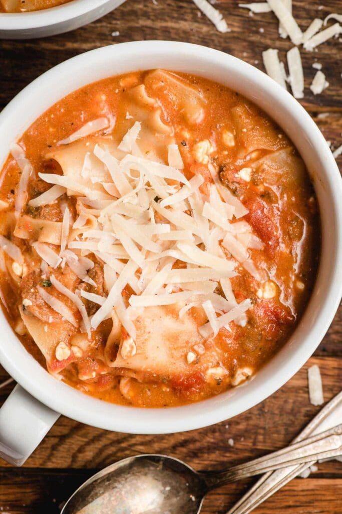 Lasagna soup with cottage cheese in a bowl.