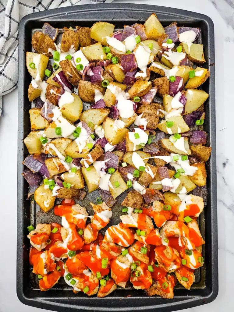 Sheet pan buffalo chicken with roasted potatoes.