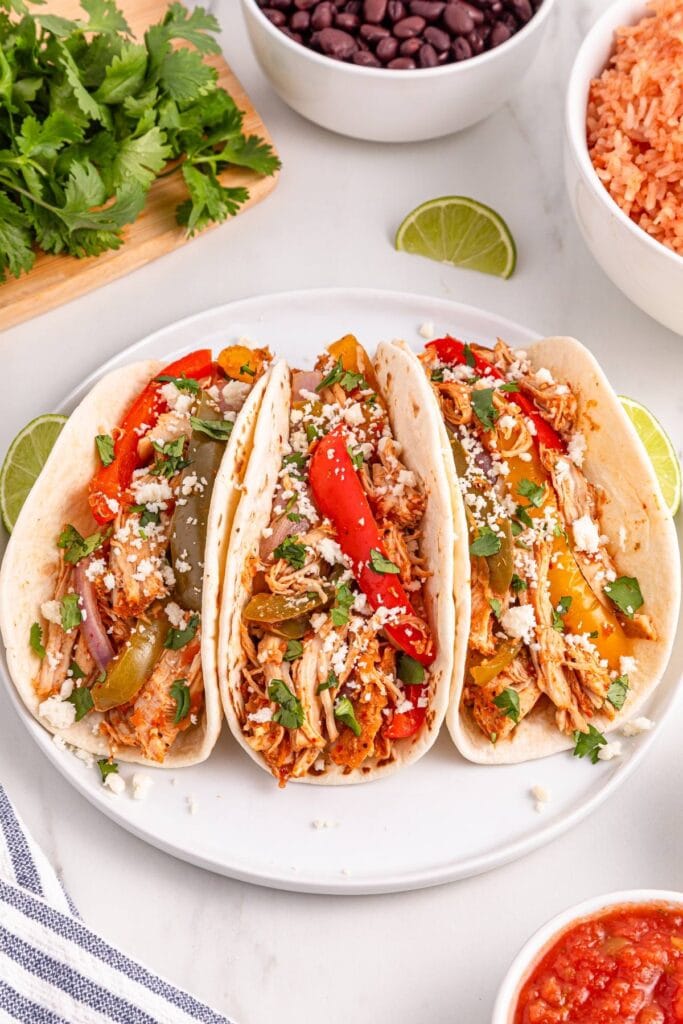 Slow cooker chicken fajitas on a plate.