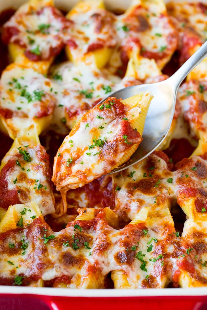Stuffed shells on a spoon.